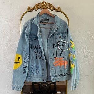 Stylish Blue Jean Jacket with Colorful Graphics